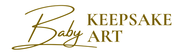 Logo for Baby Keepsake Art with gold text on a white background