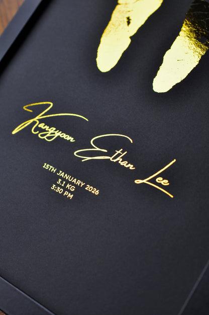 Black background with gold text and handprints