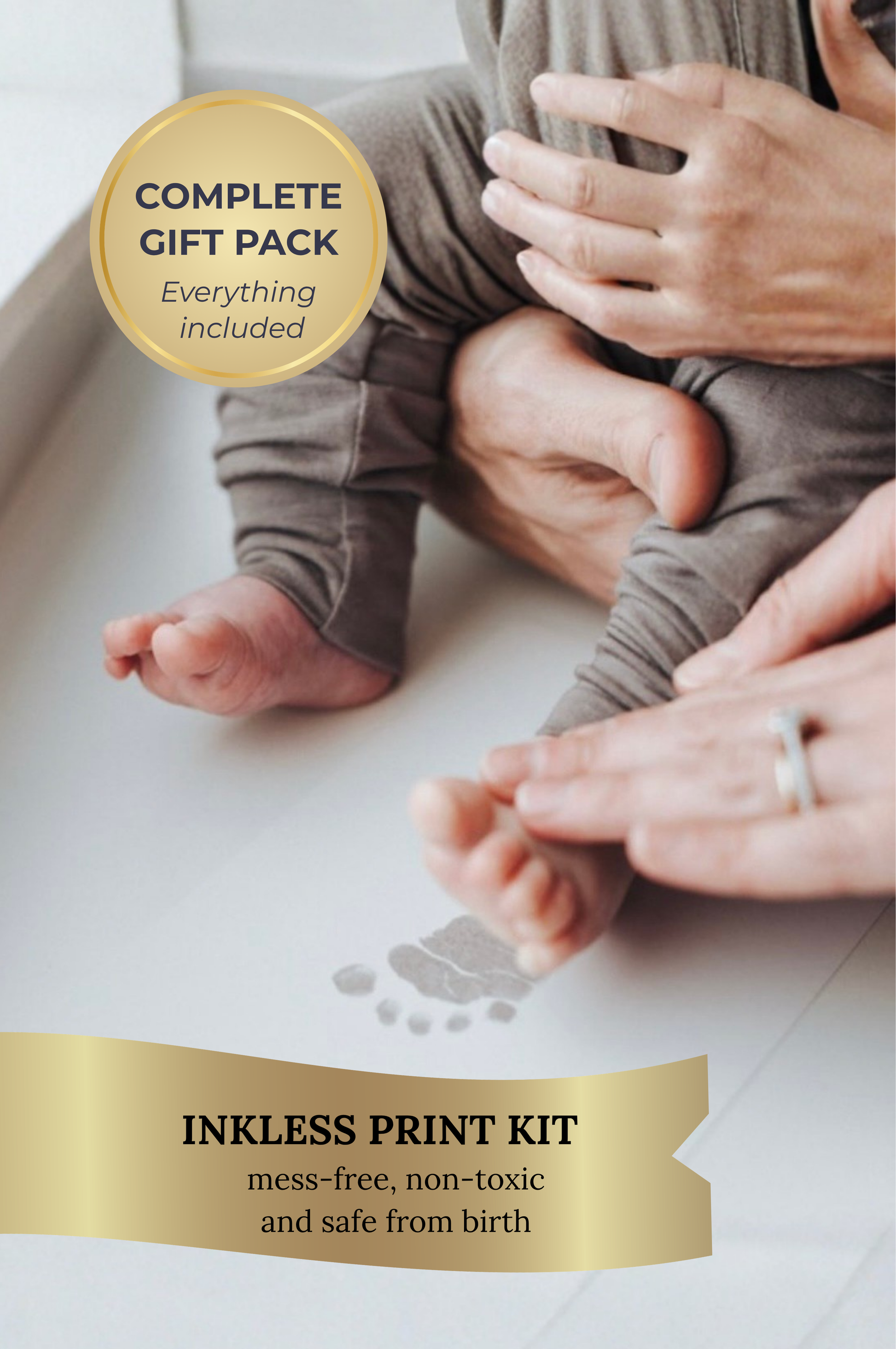 Baby's feet with inkless print kit application, showing a complete gift pack with everything included.