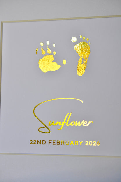Decorative card with gold footprints and 'Sunflower 22nd February 2020' text on a white background