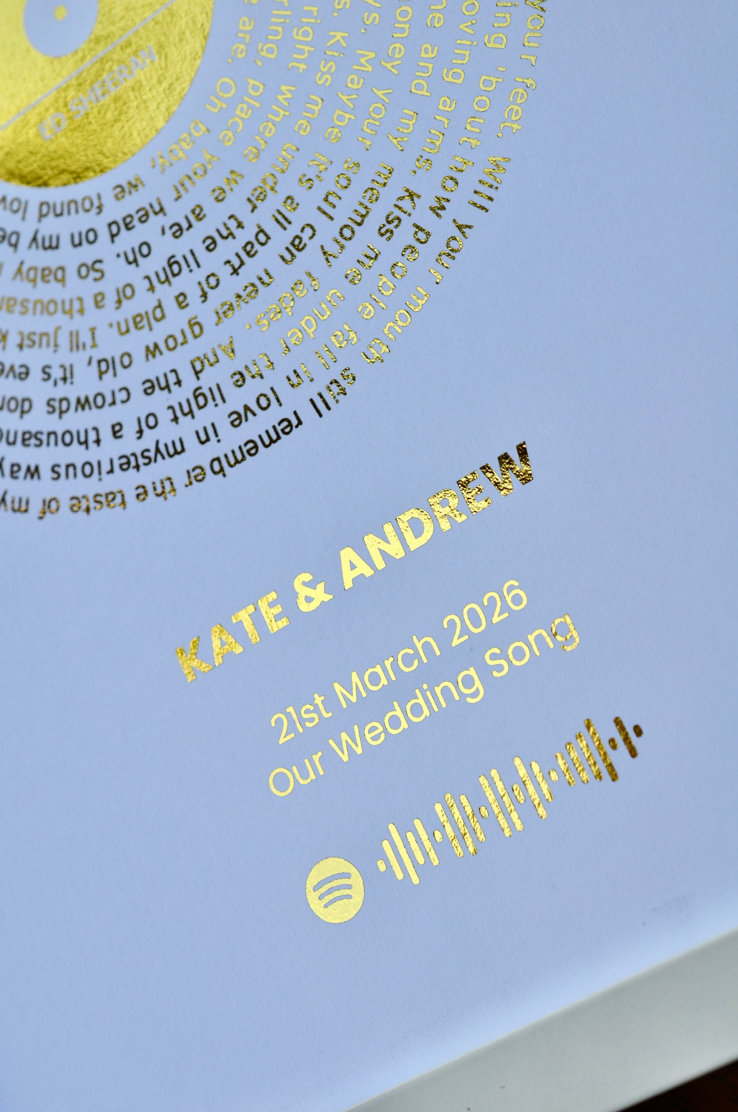 Personalized wedding song print with gold text on a white background